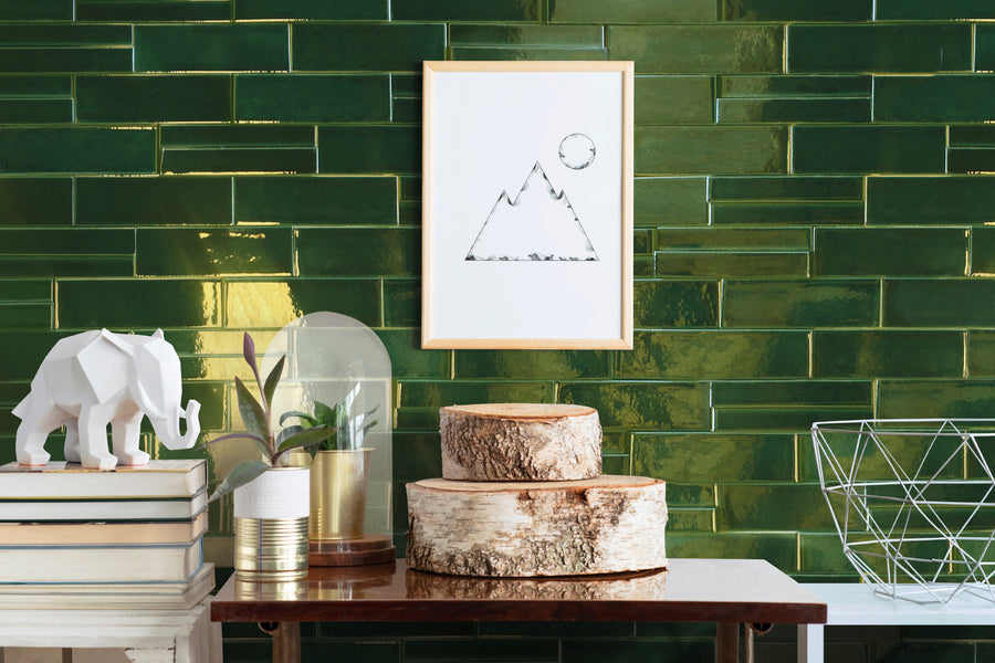Casablanca Emerald 2x6 glossy ceramic subway extruded tile conveying a rich emerald green character with its classic subway format and light-catching glossy finish