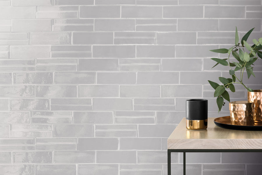 Casablanca Pearl Gray 2x6 glossy ceramic subway extruded tile conveying a cool pearl grey character with its classic subway format and light-catching glossy finish