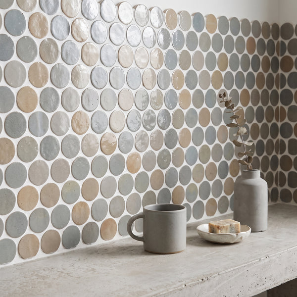 Zellige Bespoke Twilight Bloom 2-inch circle glossy terracotta hand cut mosaic conveying a playful artisan character with its rich twilight bloom tone and circular hand cut tile pattern