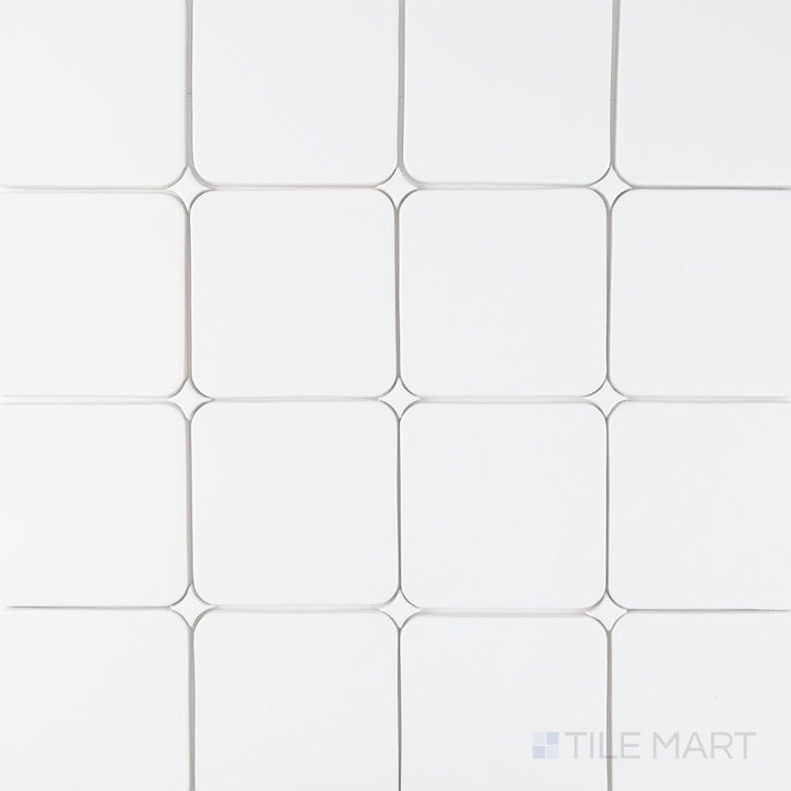 Full view of Curves Halo Ice 6x6 glossy ceramic tile showing symmetrical design and cool-toned glossy surface