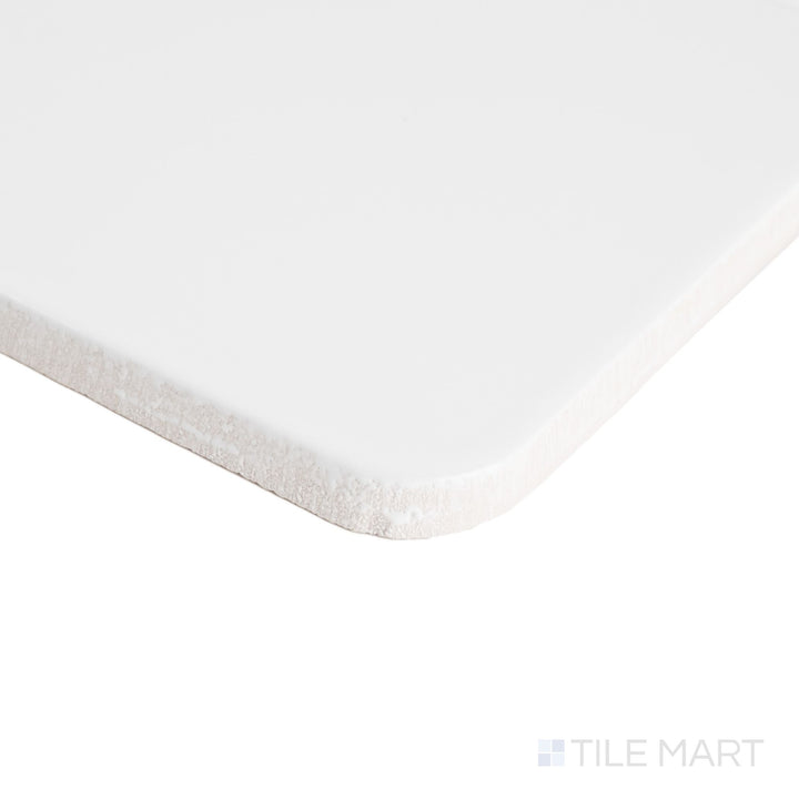 Curves Halo Ice 6x6 glossy ceramic tile corner shot focusing on the tile’s cool-toned gloss and defined, square edge