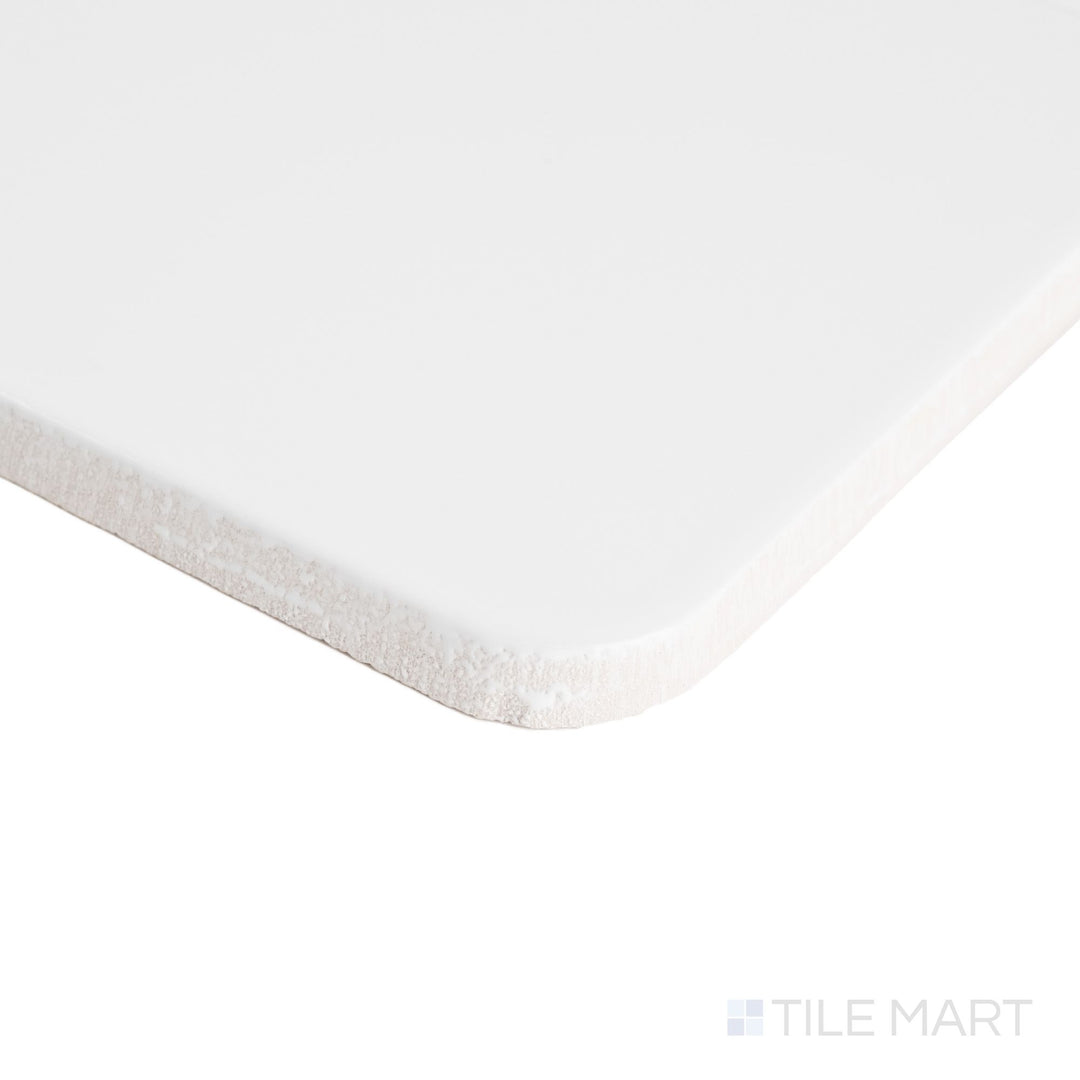 Curves Halo Ice 6x6 glossy ceramic tile corner shot focusing on the tile’s cool-toned gloss and defined, square edge