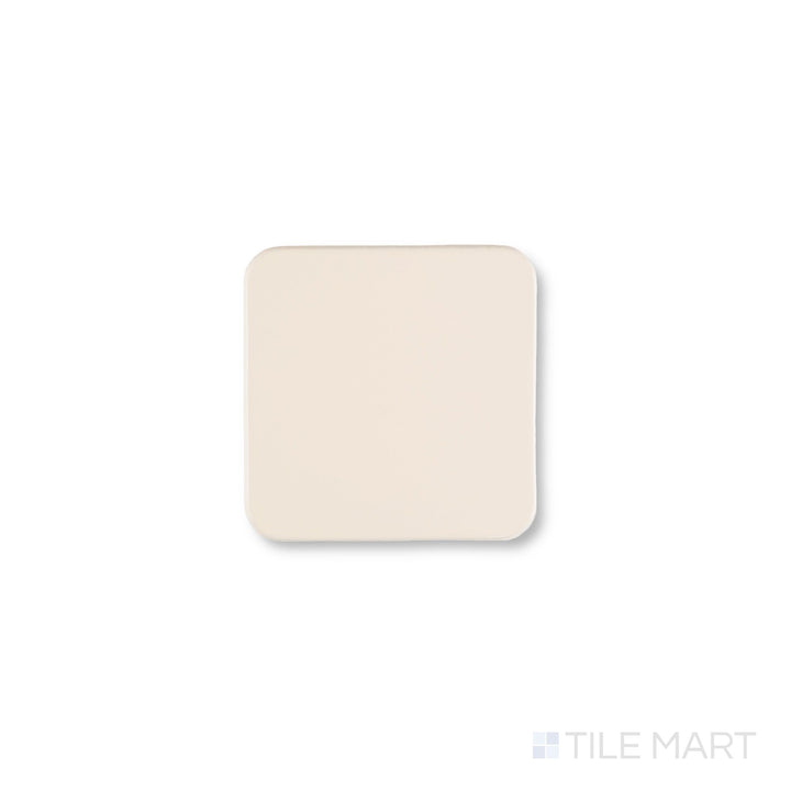 Top-down view of Curves Halo Ivory 6x6 glossy ceramic tile, featuring a smooth ivory surface and elegant finish ideal for modern interiors