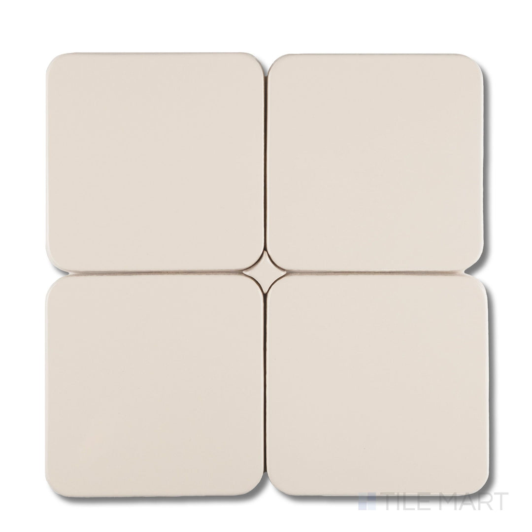 Set of four Curves Halo Ivory 6x6 glossy ceramic tiles highlighting rounded edges, seamless alignment, and smooth ivory surface