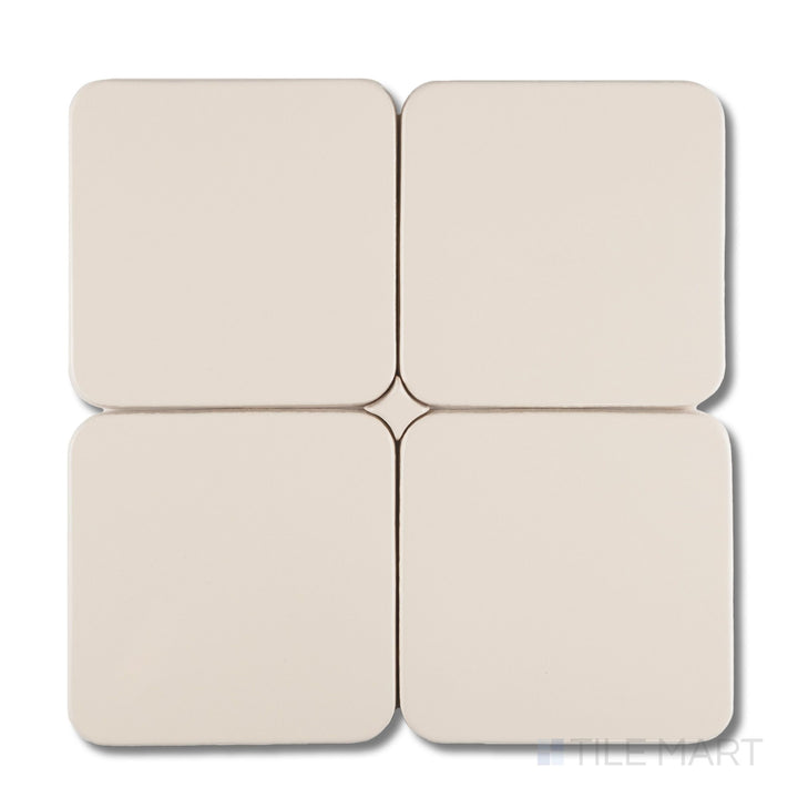 Set of four Curves Halo Ivory 6x6 glossy ceramic tiles highlighting rounded edges, seamless alignment, and smooth ivory surface