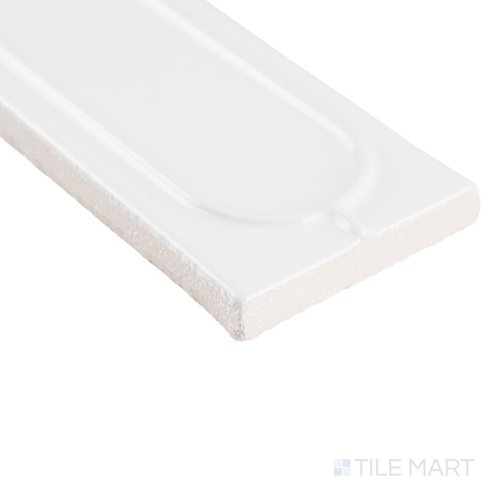 Detail corner shot of Curves Sophee Ice 2.5x6 glossy ceramic tile, showcasing the icy surface and refined edge craftsmanship