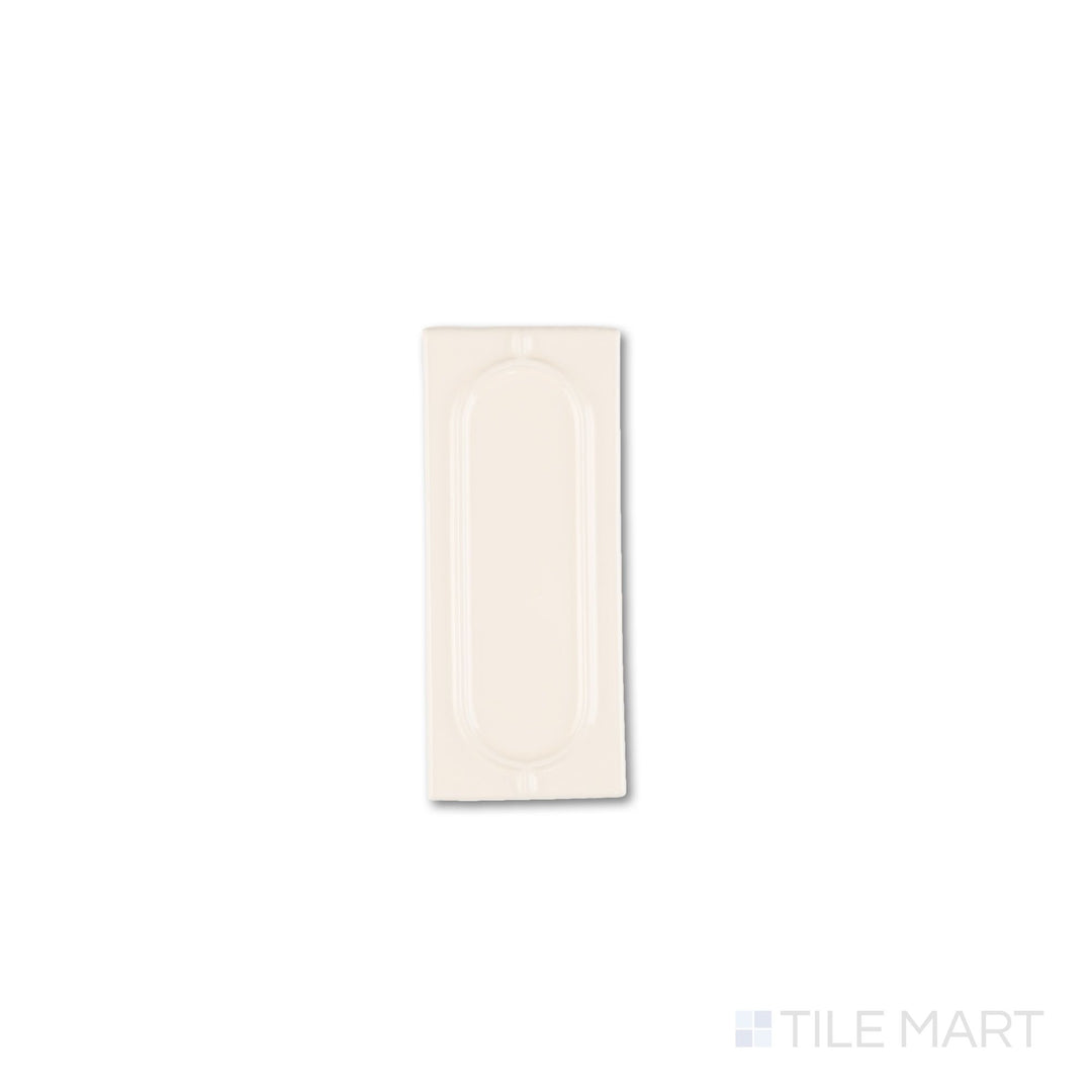 Top-down view of Curves Sophee Ivory 2.5x6 glossy ceramic tile, highlighting its warm ivory tone and refined ceramic texture