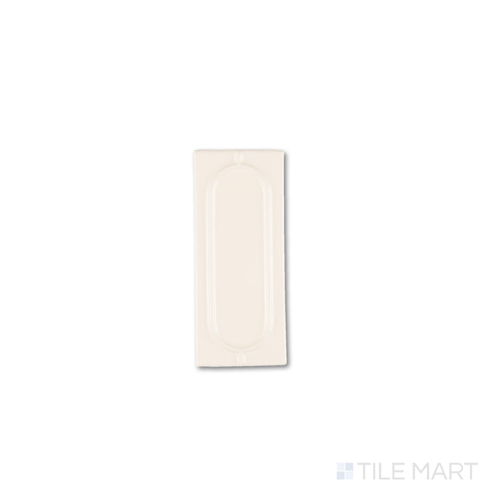 Top-down view of Curves Sophee Ivory 2.5x6 glossy ceramic tile, highlighting its warm ivory tone and refined ceramic texture