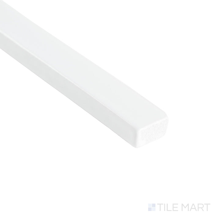 Curves Ice 5/8x6 glossy ceramic pencil tile corner view highlighting its slender profile and gleaming ice finish