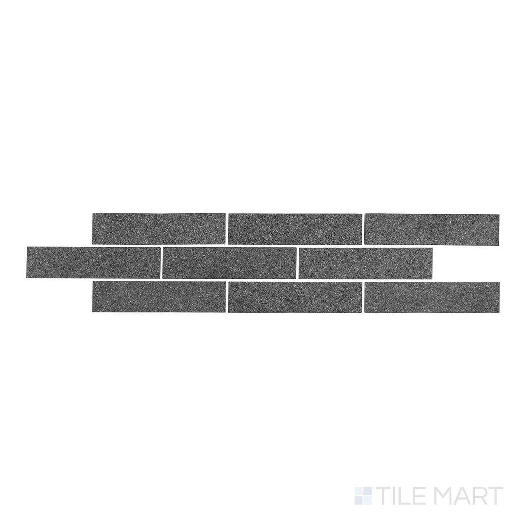 Close-up of meshed Lime Black thin brick limestone mosaic with a tumbled stone texture