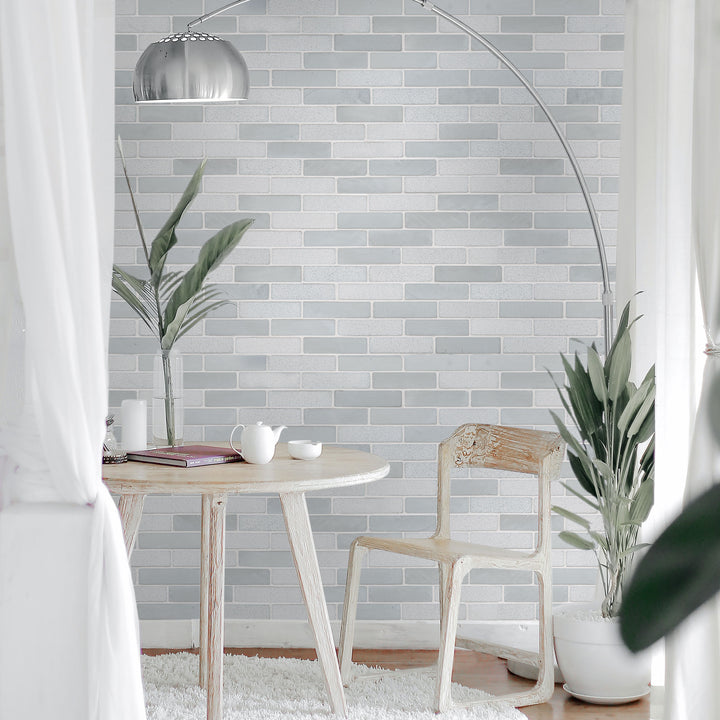 Skyline thin brick sandstone mosaic displayed in a contemporary space highlighting bush-hammered texture