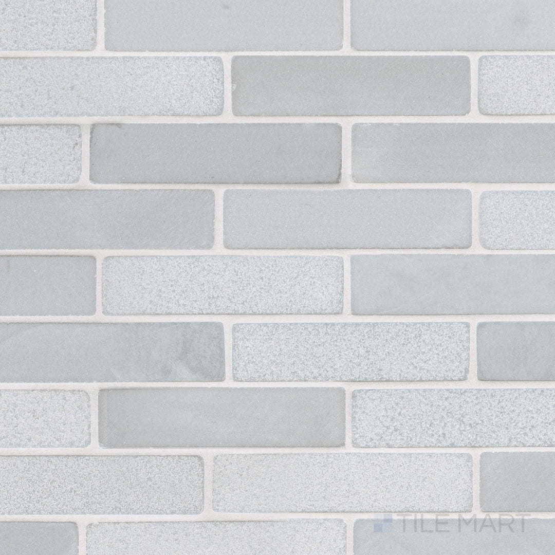 Skyline thin brick sandstone mosaic on mesh with bush-hammered and tumbled texture