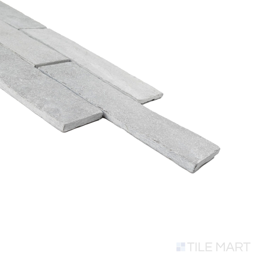 Corner detail of Skyline thin brick sandstone mosaic with bush-hammered texture and rugged stone surface