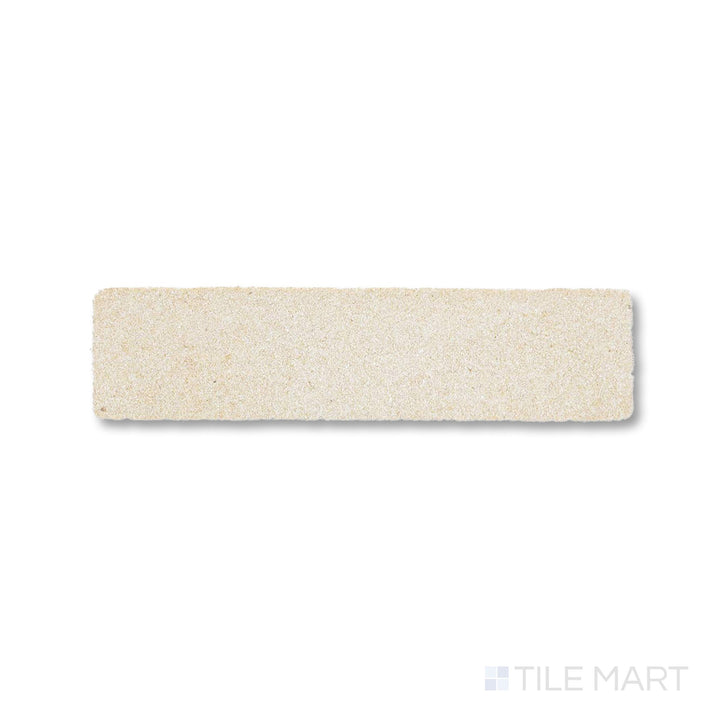 Close view of loose Sedona 2x8 thin brick sandstone with a softly weathered finish