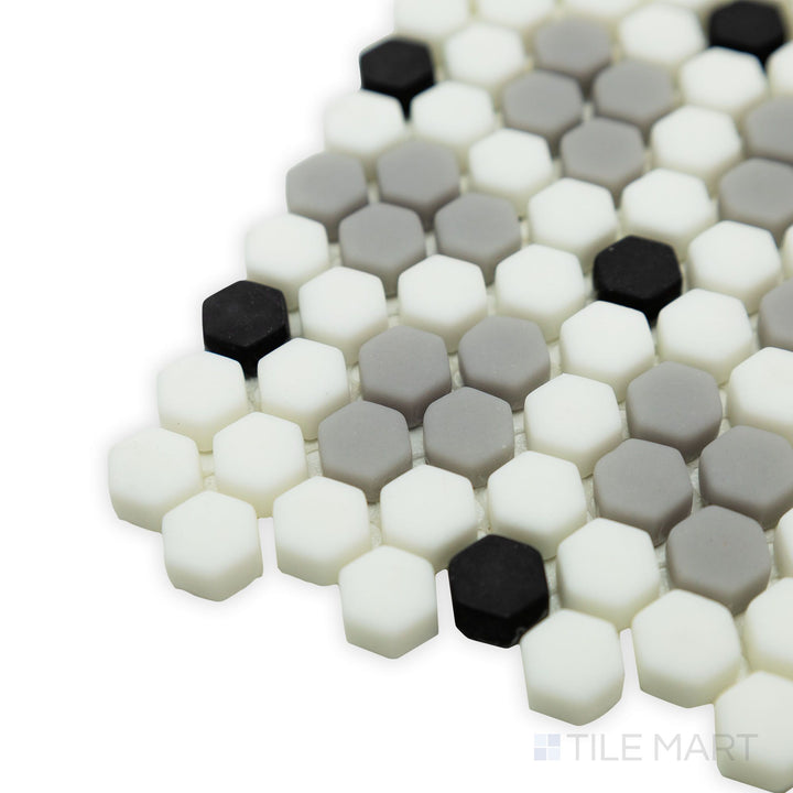 A refined corner view of Geometro Bayeux Classic 3/8" hexagon matte recycled glass mosaic, featuring a timeless hexagon layout and a smooth, muted texture.