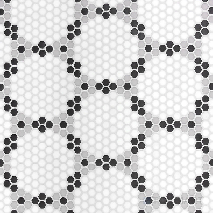 Top-view photo of Geometro Bourges Classic 3/8" hexagon matte recycled glass mosaic, displaying a geometric hexagonal arrangement with a refined matte finish.