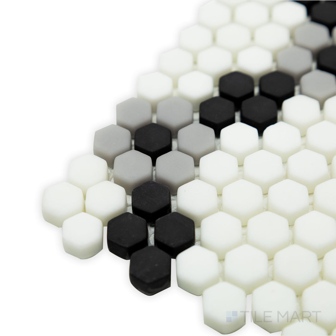 A sleek and modern corner shot of Geometro Bourges Classic 3/8" hexagon matte recycled glass mosaic, emphasizing its uniform hexagonal shapes and soft matte sheen.