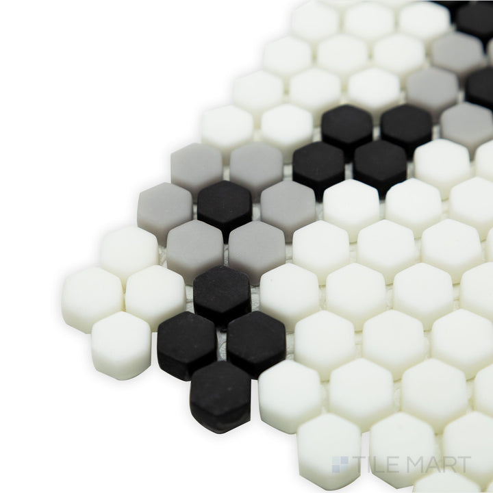 A sleek and modern corner shot of Geometro Bourges Classic 3/8" hexagon matte recycled glass mosaic, emphasizing its uniform hexagonal shapes and soft matte sheen.