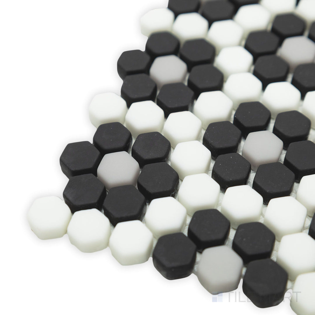 Geometro Dijon Classic 3/8" hexagon matte recycled glass mosaic in a close-up corner perspective, showcasing its elegant geometric arrangement and subtle matte finish.