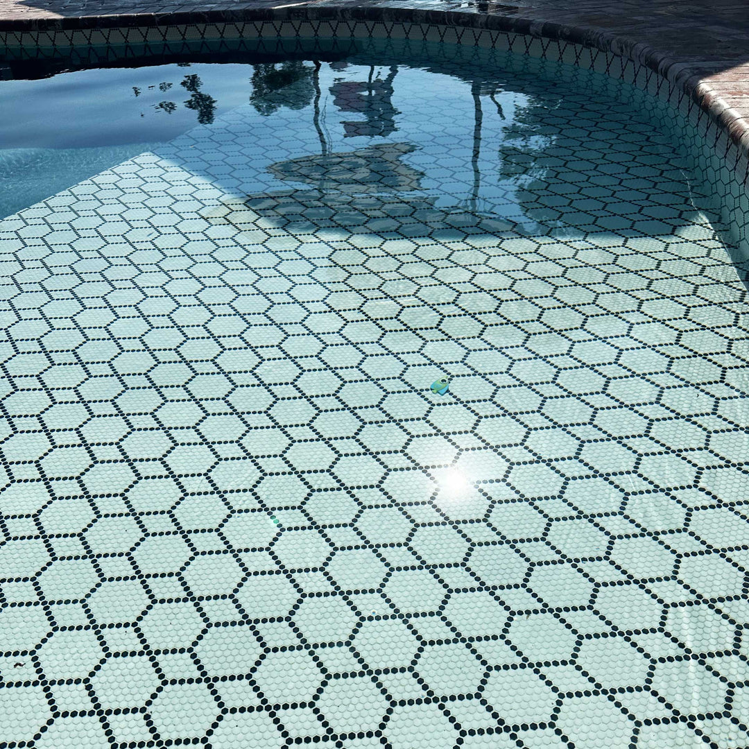 A delicate hexagonal design with muted tones and a matte texture adds depth and sophistication, making Geometro Tulle Classic 3/8" hexagon matte recycled glass mosaic a versatile choice.