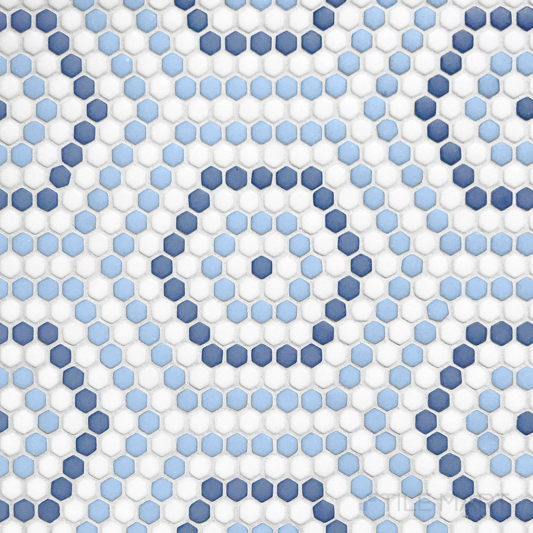 Flat-lay shot of Geometro Belfort Coastal 3/8" hexagon matte recycled glass mosaic, showcasing an intricate hexagonal arrangement with a modern matte surface.