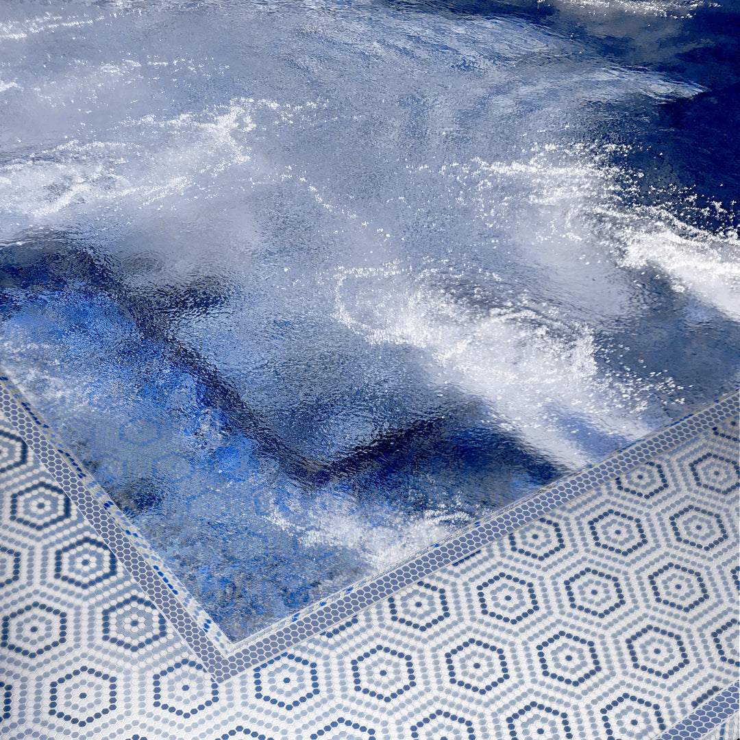 A cool coastal palette in a matte recycled glass finish makes Geometro Belfort Coastal hexagon mosaic a soothing yet stylish choice.