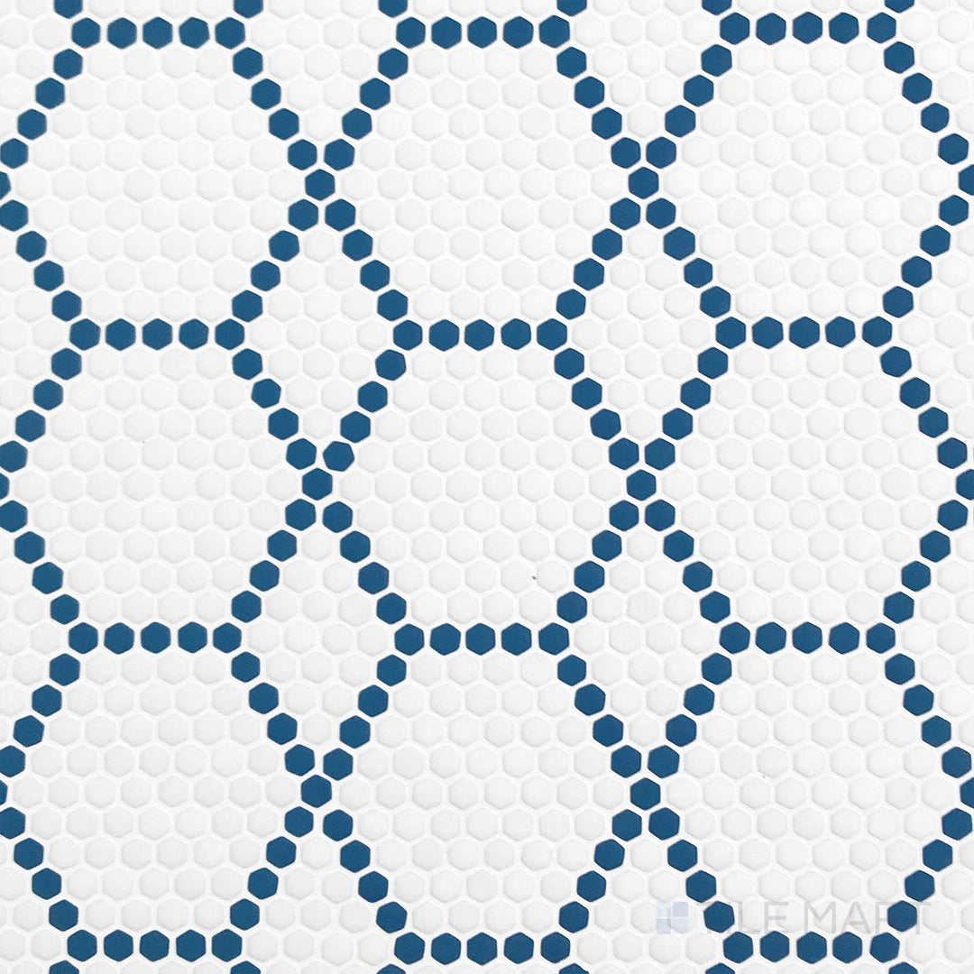 Overhead image of Geometro Tulle Coastal 3/8" hexagon matte recycled glass mosaic, showcasing a sleek hexagonal design with a soft matte texture.