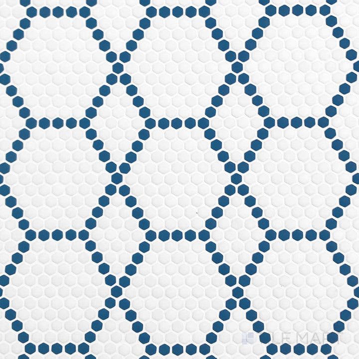 Overhead image of Geometro Tulle Coastal 3/8" hexagon matte recycled glass mosaic, showcasing a sleek hexagonal design with a soft matte texture.