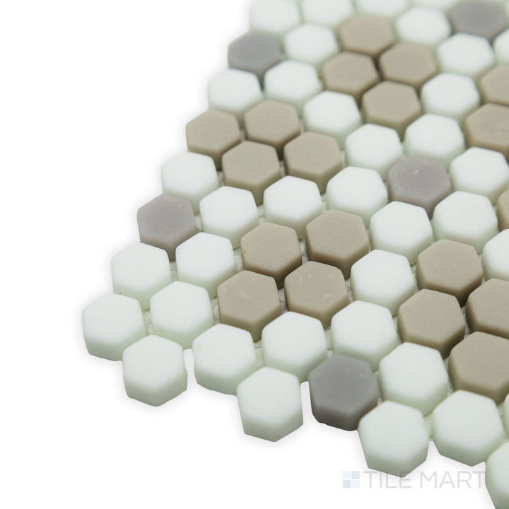 Rustic charm meets modern design in this corner view of the Geometro Bayeux Country 3/8" hexagon matte recycled glass mosaic, showcasing its smooth matte finish and geometric precision.