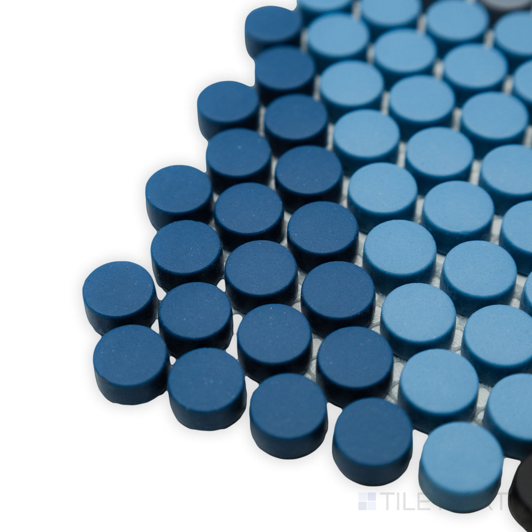 This detailed corner view captures the smooth, round design of the Geometro Hygee Glow 1/2" Round matte recycled glass mosaic, adding softness to any space.