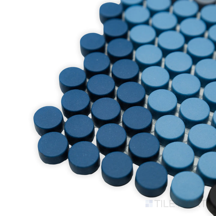 This detailed corner view captures the smooth, round design of the Geometro Hygee Glow 1/2" Round matte recycled glass mosaic, adding softness to any space.