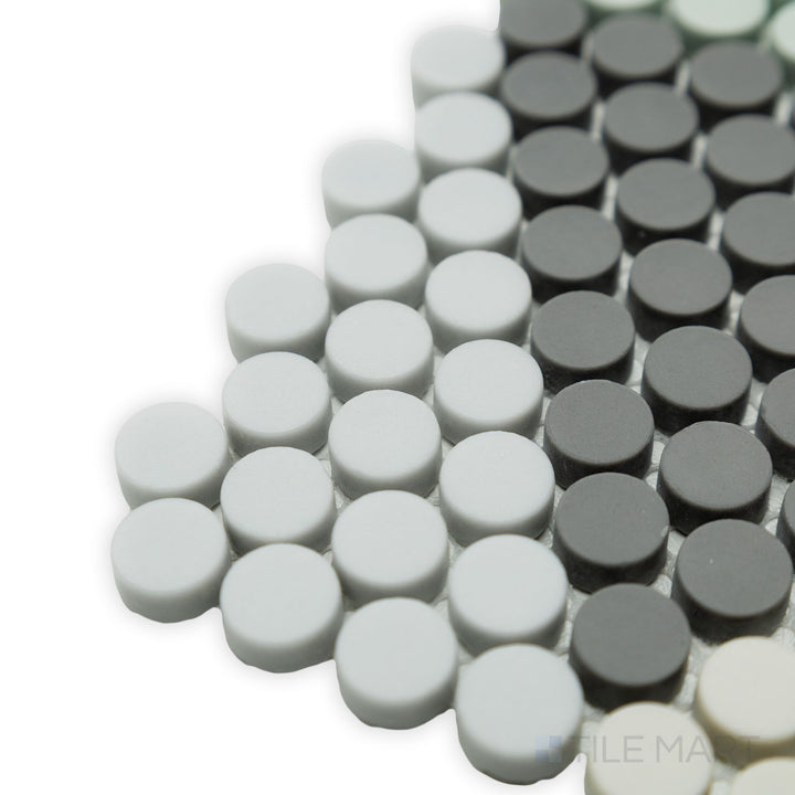 A unique cylindrical aesthetic takes center stage in this corner shot of the Geometro Hygee Log 1/2" Round matte recycled glass mosaic, offering a modern visual appeal.