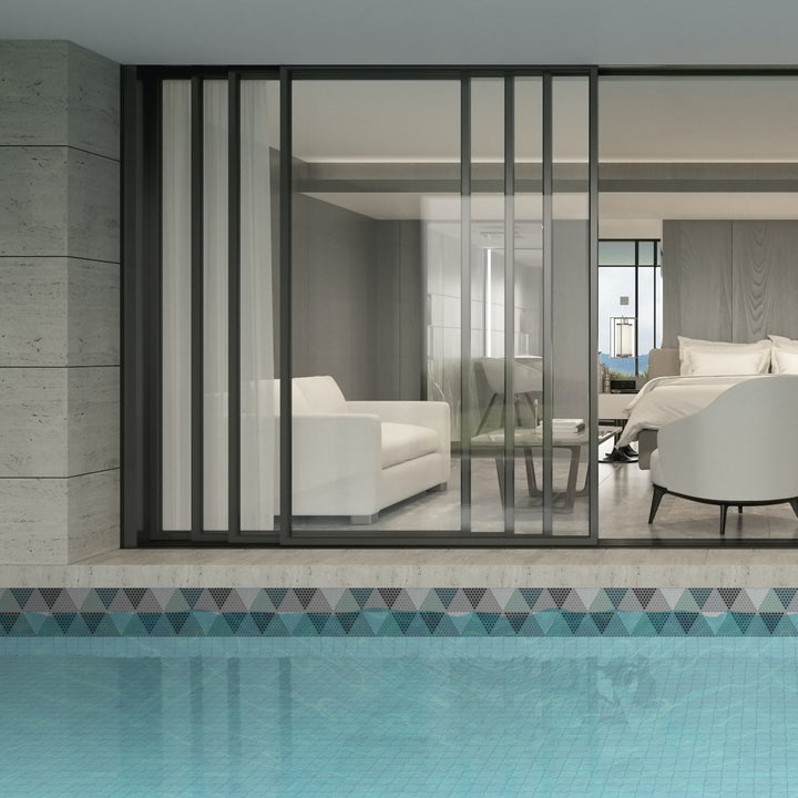 A rounded shape and a soft matte finish make Geometro Hygee Log recycled glass mosaic a unique and organic design choice.