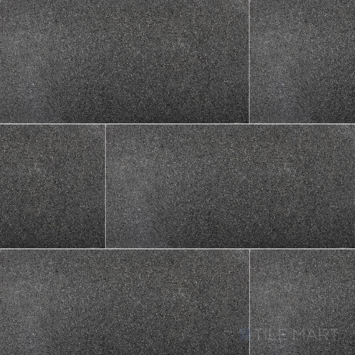Absolute Black Granite 12x24 flamed tile displayed in overview, showcasing a textured anti-slip surface with deep black coloring.