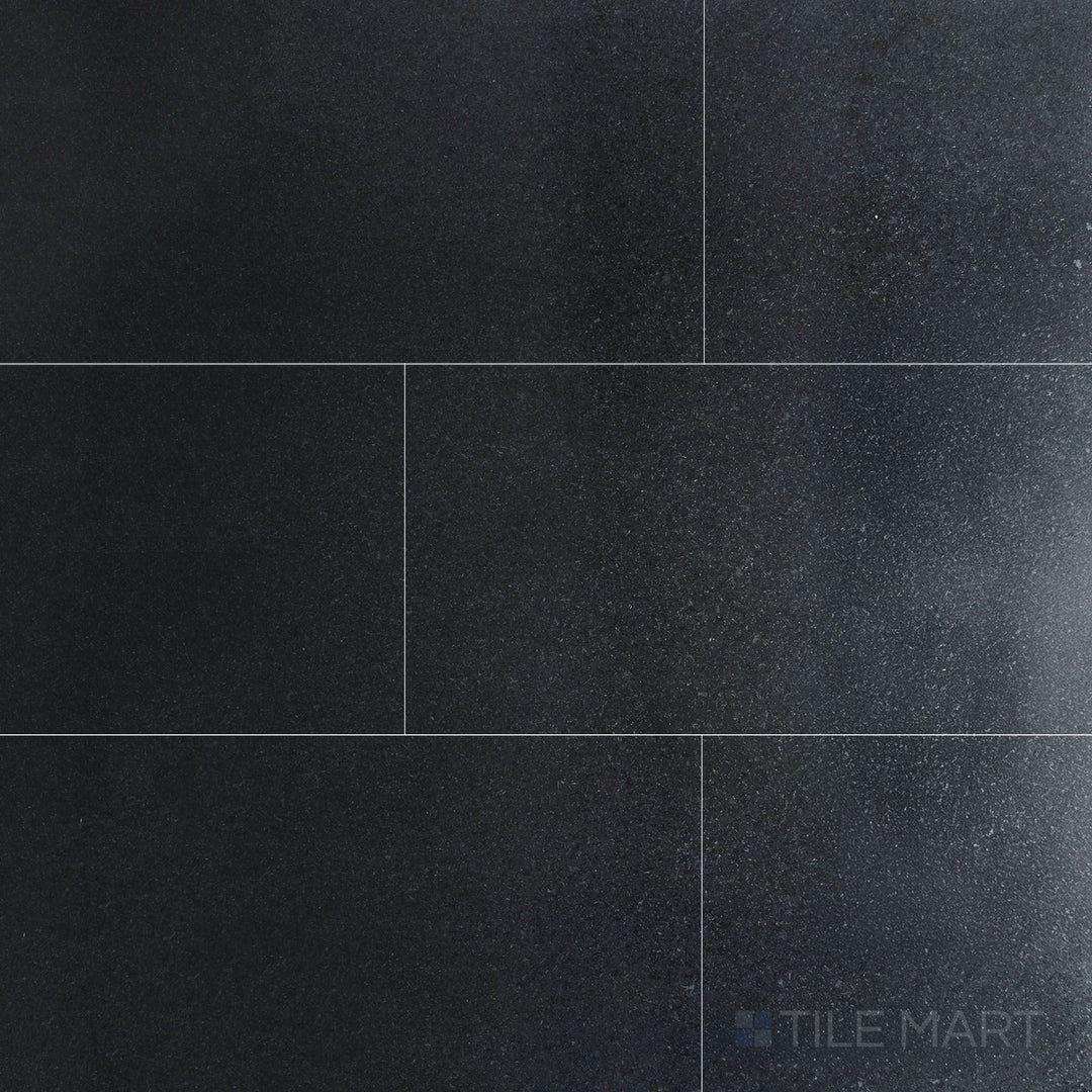 Overview of Absolute Black Granite 12x24 honed tile, featuring a smooth, matte finish with uniform black tone ideal for modern interiors.