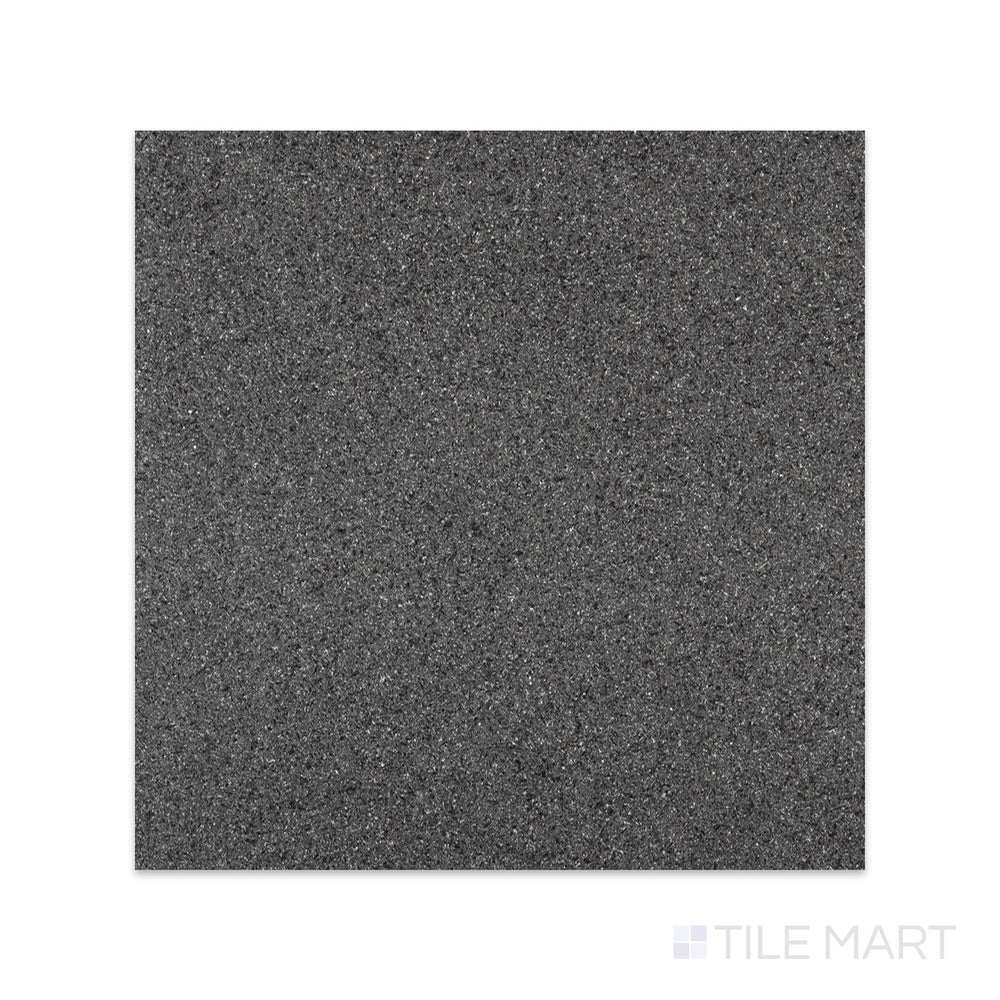 Top-down view of Absolute Black Granite 18x18 flamed tile with a coarse, slip-resistant surface texture and deep charcoal coloration.