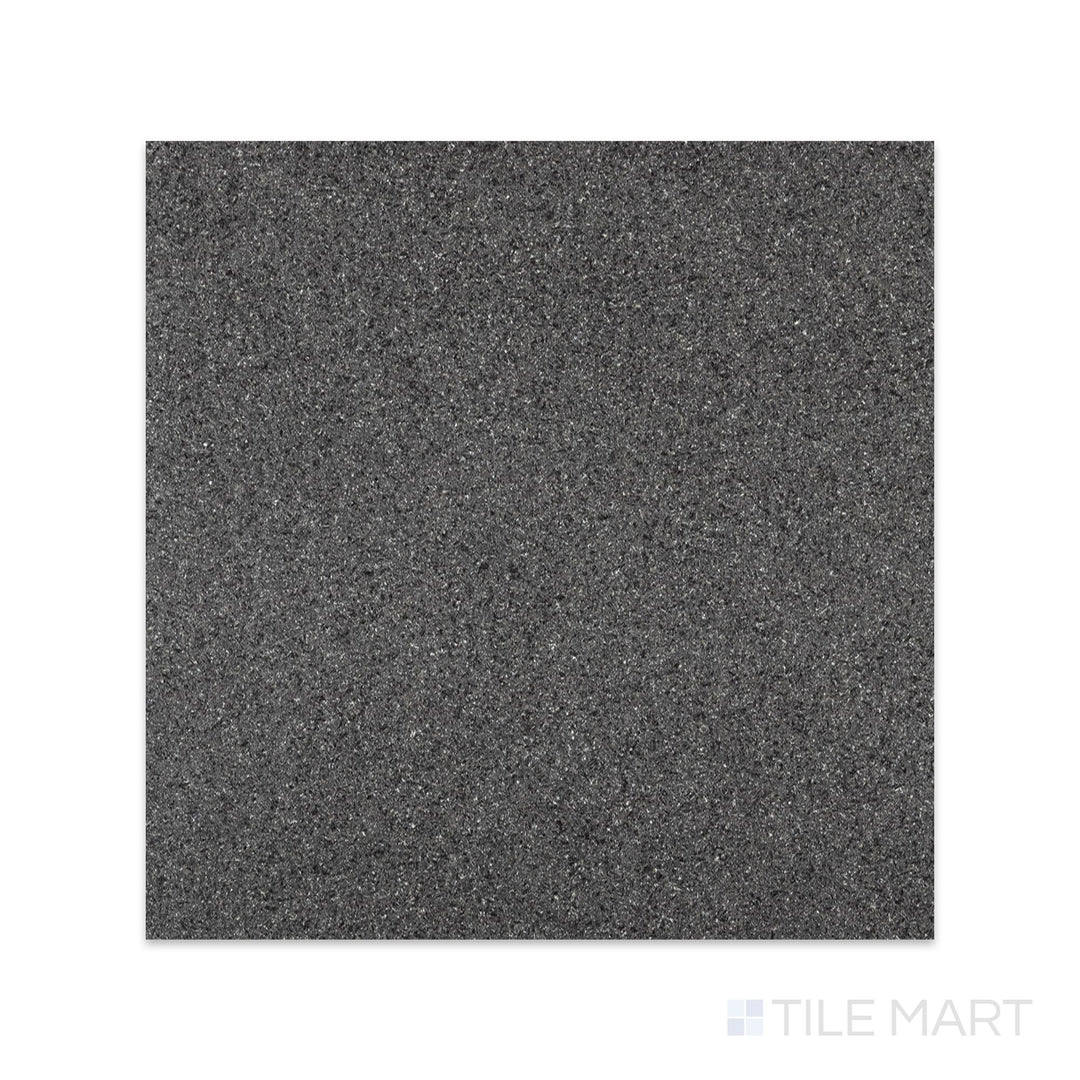 Top-down view of Absolute Black Granite 18x18 flamed tile with a coarse, slip-resistant surface texture and deep charcoal coloration.