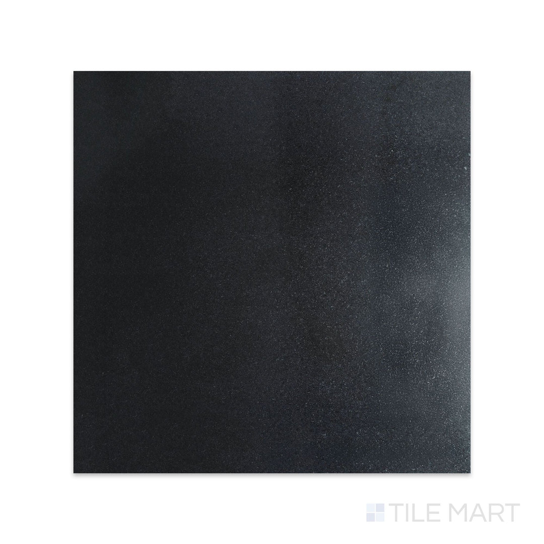 Overhead image of Absolute Black Granite 18x18 honed tile in a consistent matte black finish with a refined, soft surface appearance.