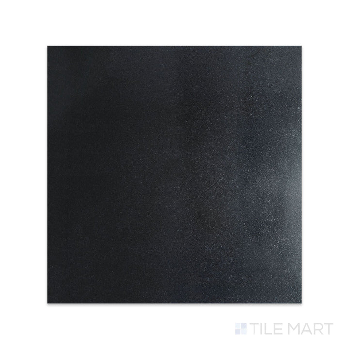 Overhead image of Absolute Black Granite 18x18 honed tile in a consistent matte black finish with a refined, soft surface appearance.