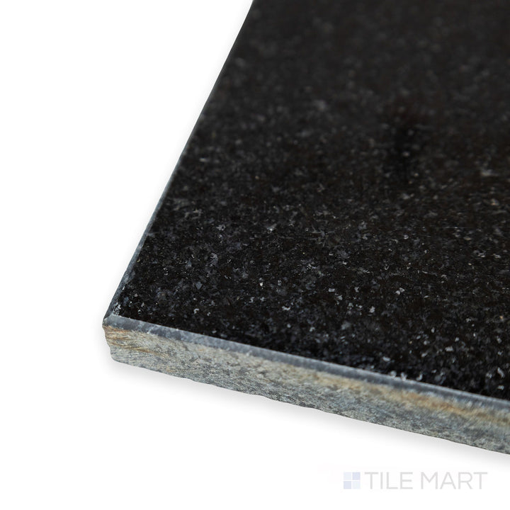 Corner detail of Absolute Black Granite 18x18 polished tile highlighting reflective finish and deep black clarity.
