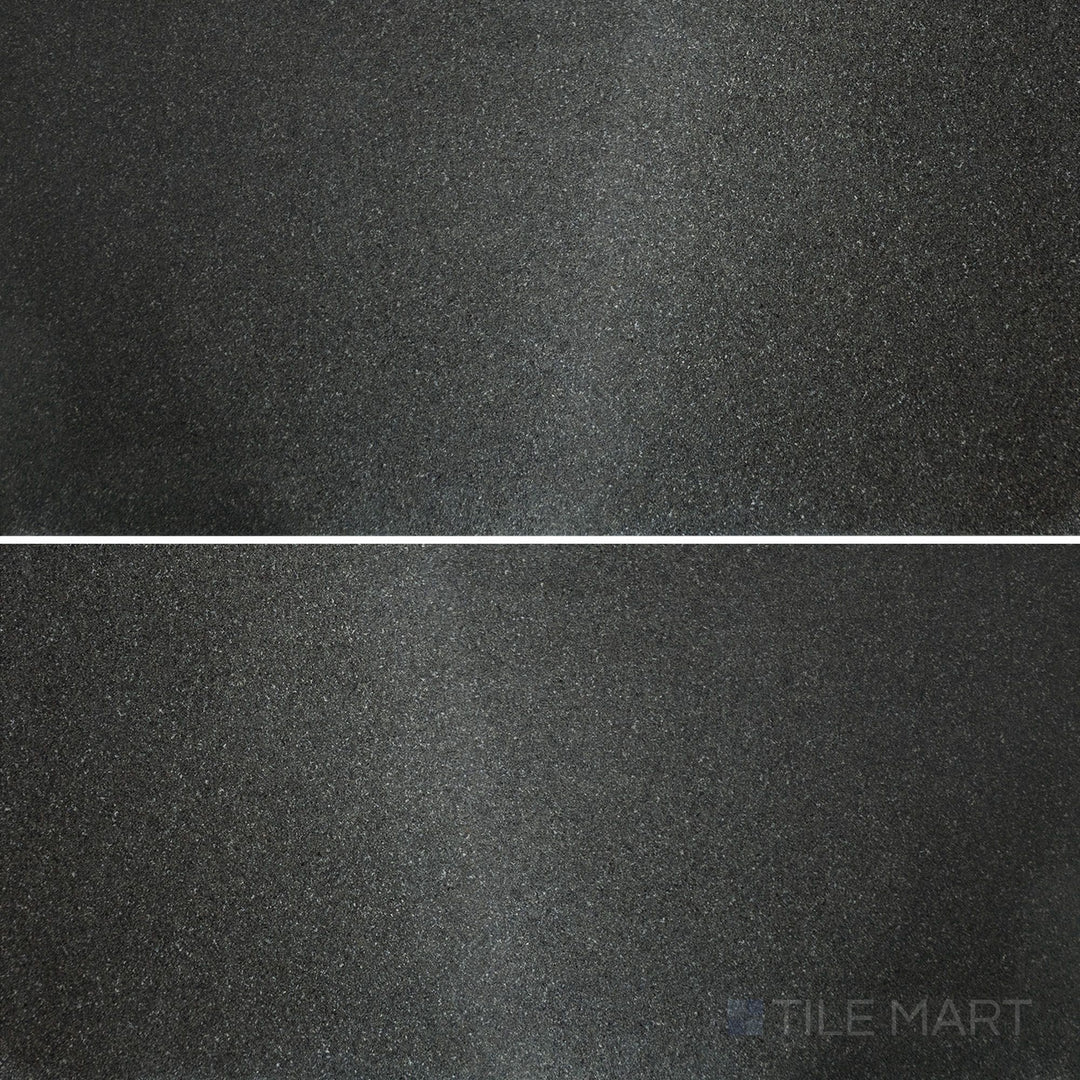 Top-down view of Absolute Black Granite 18x36 flamed tile, showcasing a textured surface with deep black tones for a bold, sophisticated finish.