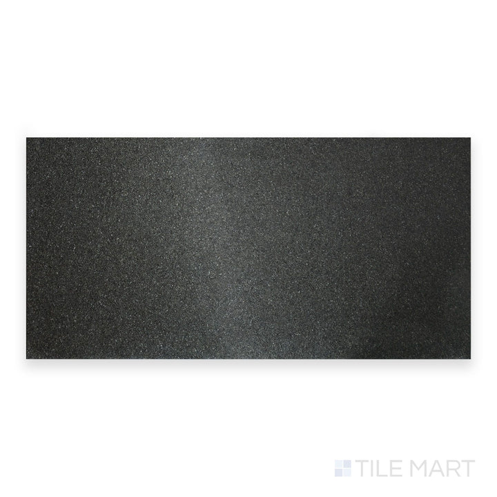 A close-up of Absolute Black Granite 18X36 Flamed, highlighting its textured surface with a natural flamed finish.