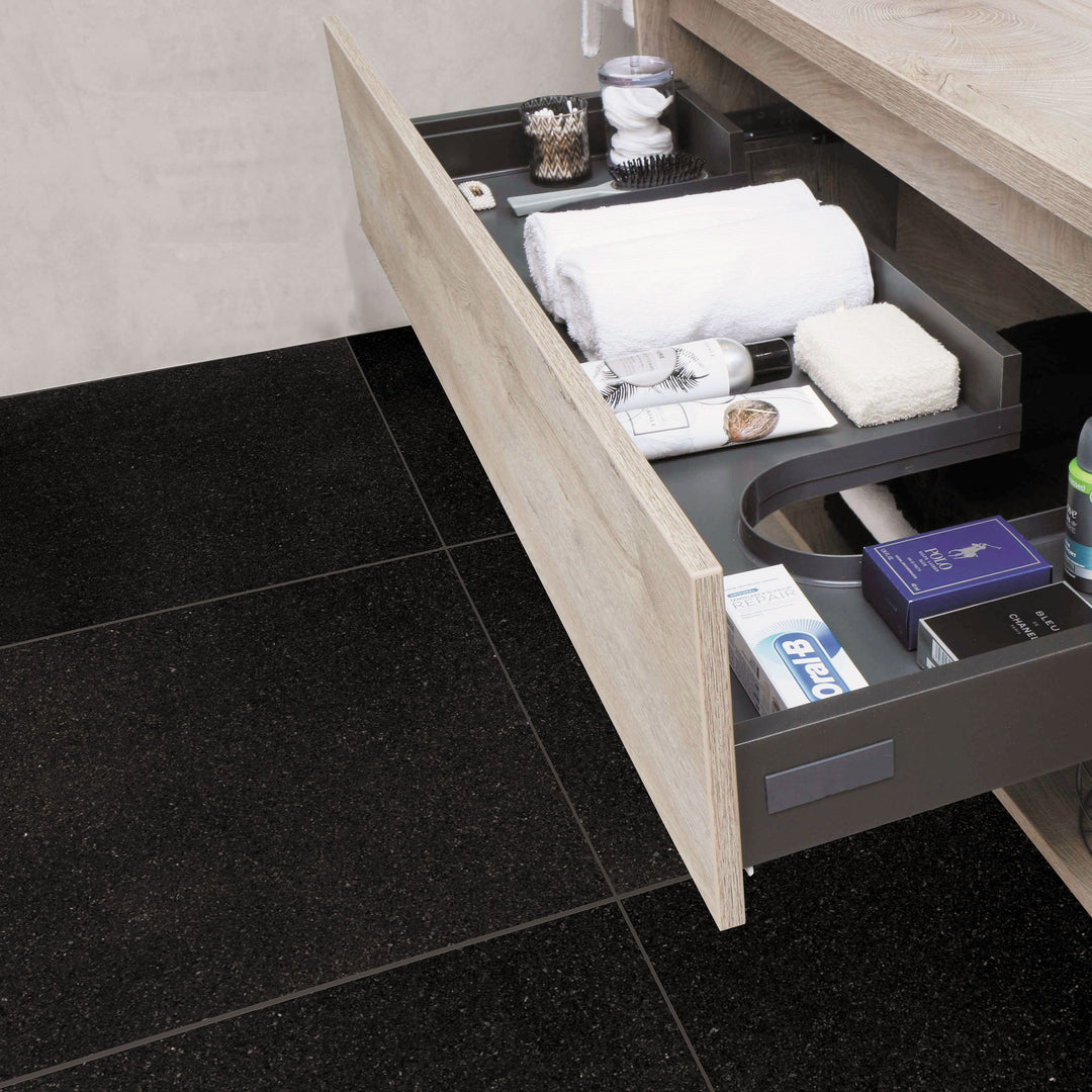 A polished and modern space showcasing Absolute Black Granite 24X24 Polished, reflecting light beautifully while adding depth and sophistication to the setting.