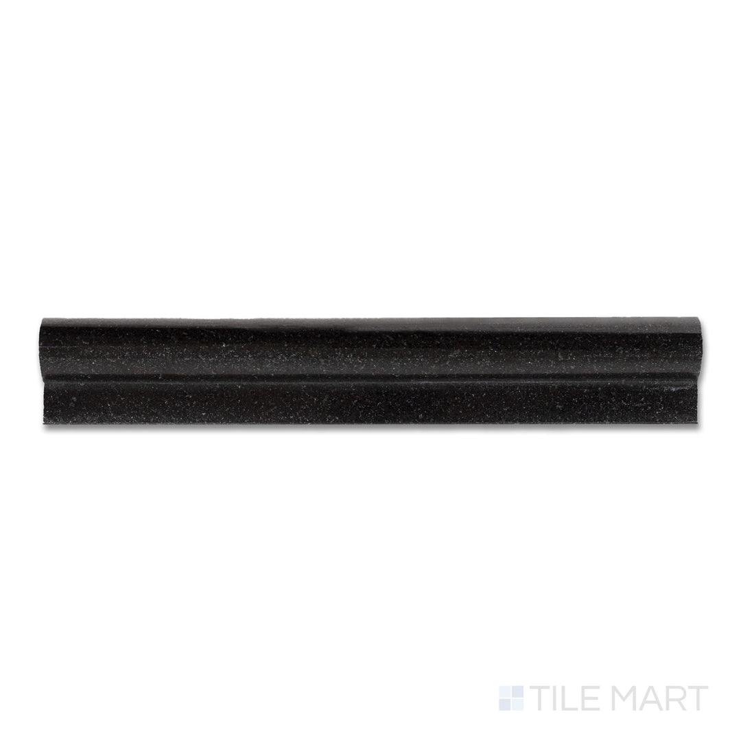Top-down close-up of Absolute Black Granite 2x12 polished chair rail trim, with a curved profile and glossy black finish for decorative edging.