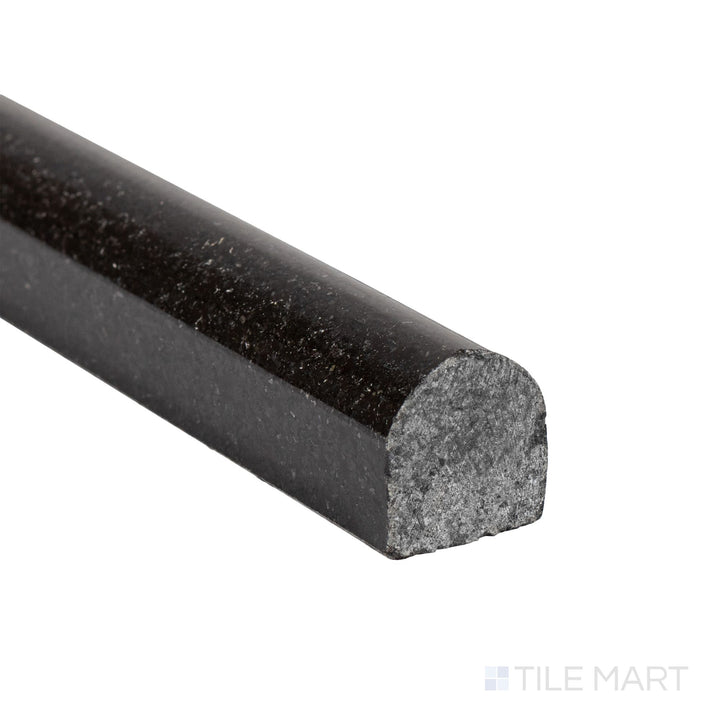 Corner detail of Absolute Black Granite 0.75x12 polished standard liner highlighting glossy surface and refined profile.