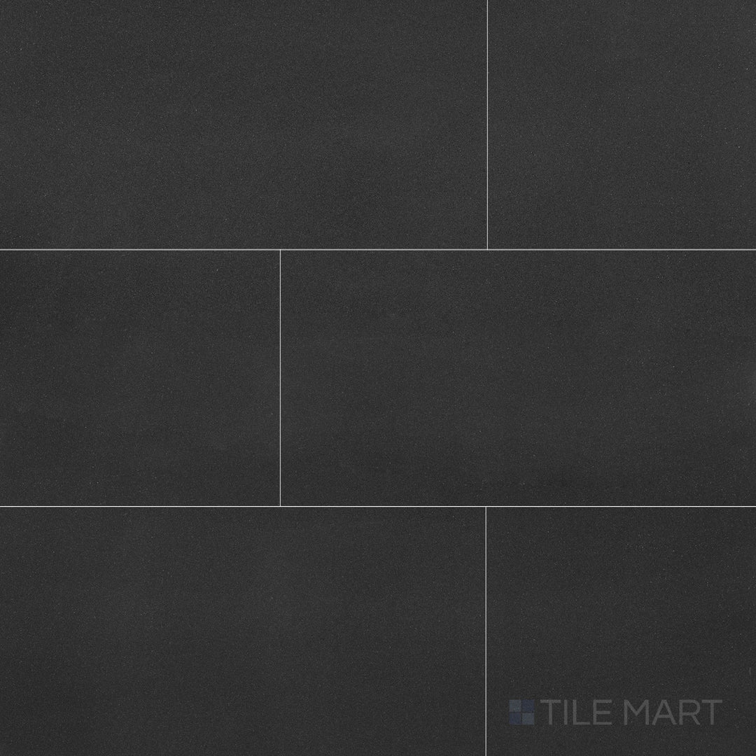 Full view of Basalt Black 12x24 honed tile, showcasing rich volcanic stone texture and smooth surface for modern design aesthetics.