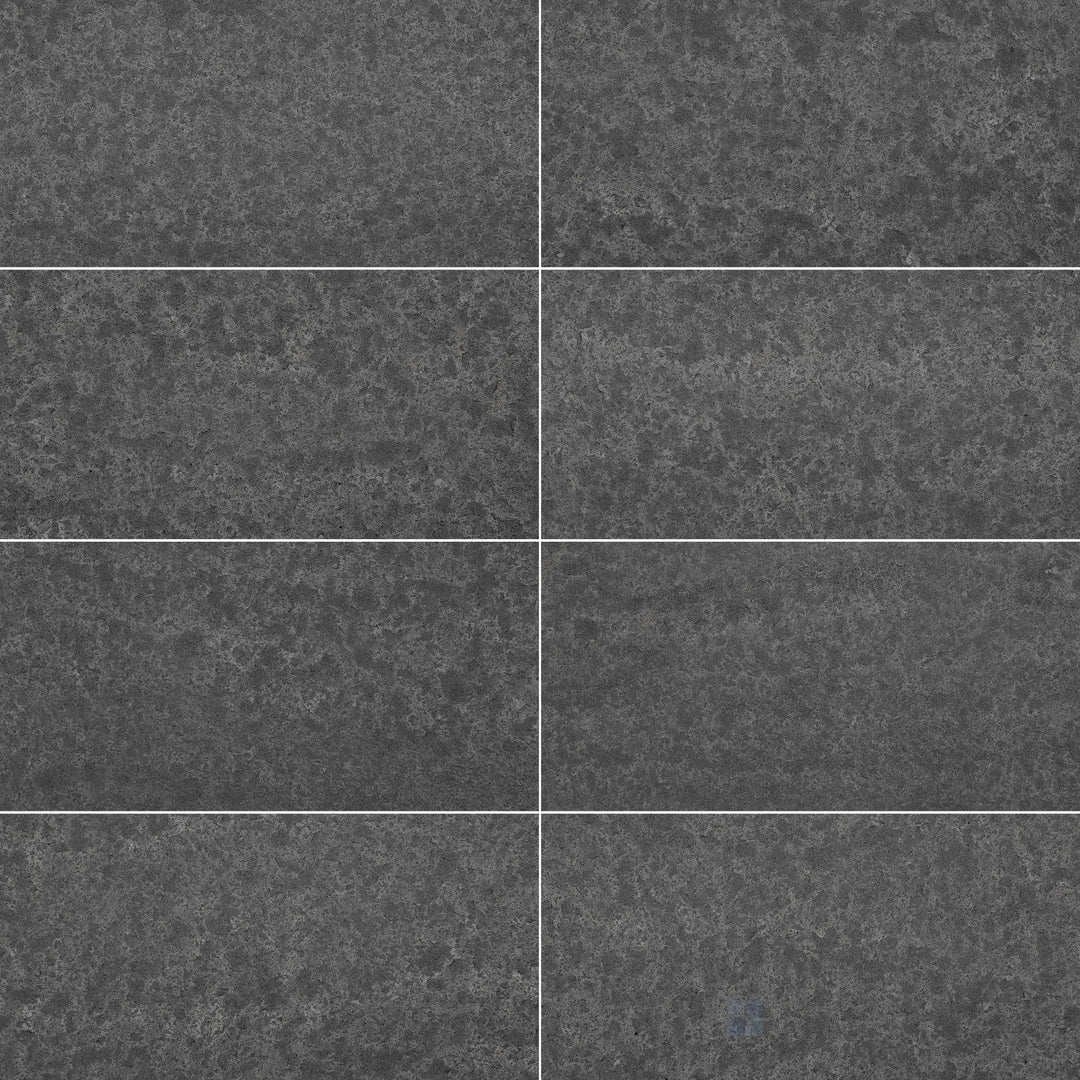 Basalt Black 12x24 tile with a flamed and brushed surface and refined stone texture