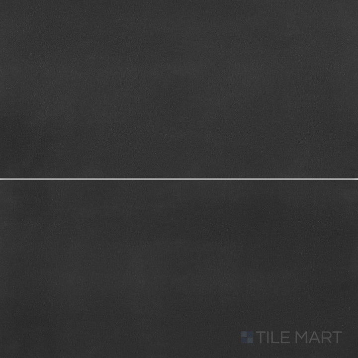 Overhead image of Basalt Black 18x36 honed tile, featuring a matte honed surface that showcases the stone’s natural deep black hues.