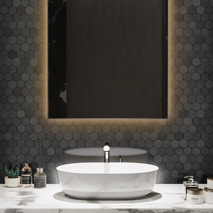 A luxurious setting featuring Basalt Black 2" Hexagon Honed Mosaic, demonstrating how small-format mosaics can create a dynamic and textured surface.
