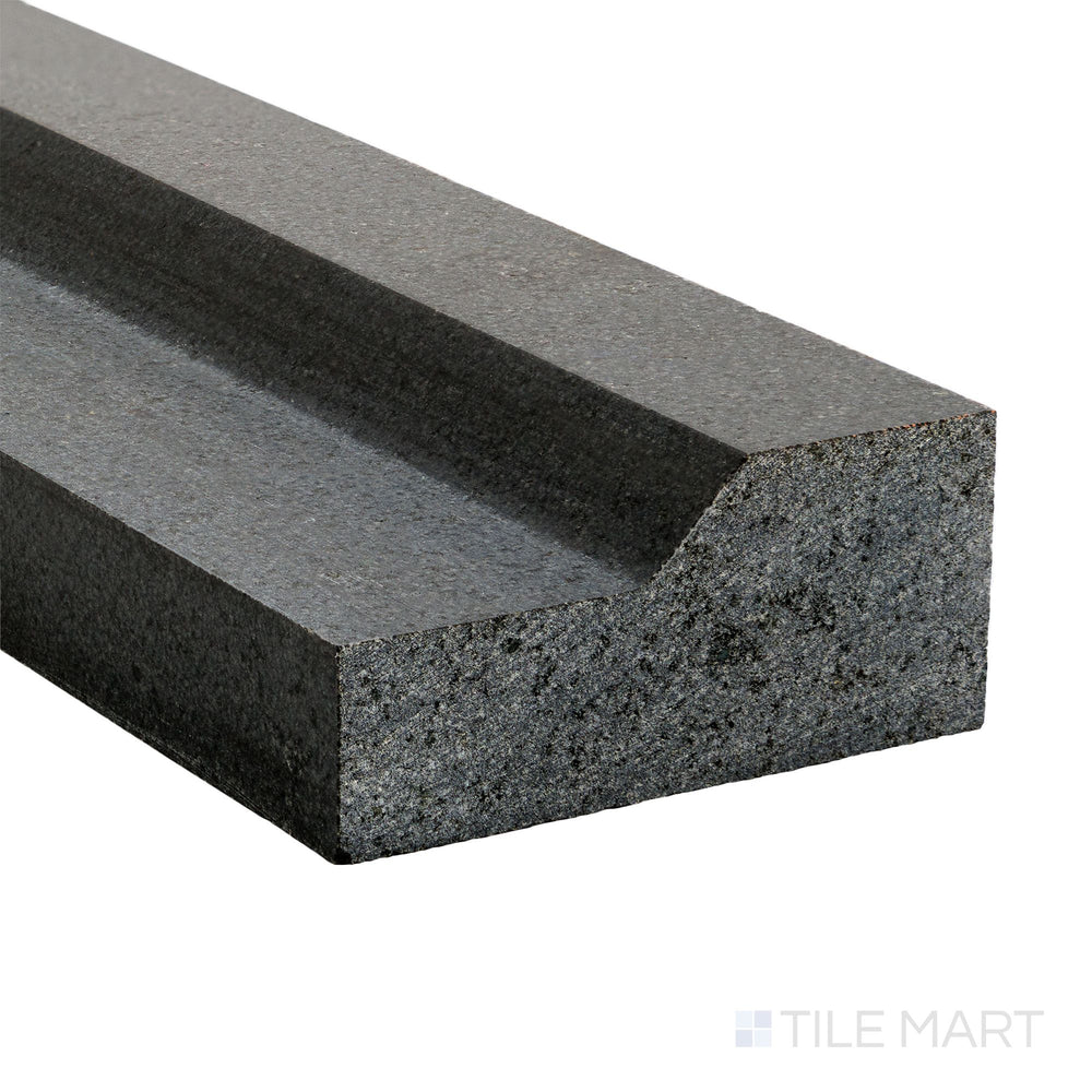 Corner close-up of Basalt Black 2x12 honed modern chair rail showing sleek edge detail and soft matte finish.